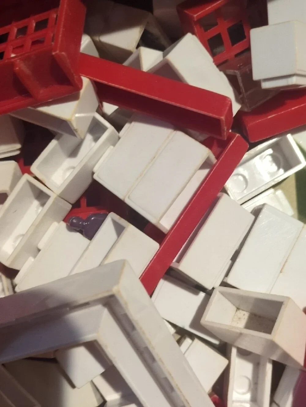 Assorted Kids Building Set Pieces in Red, White, Green, Orange